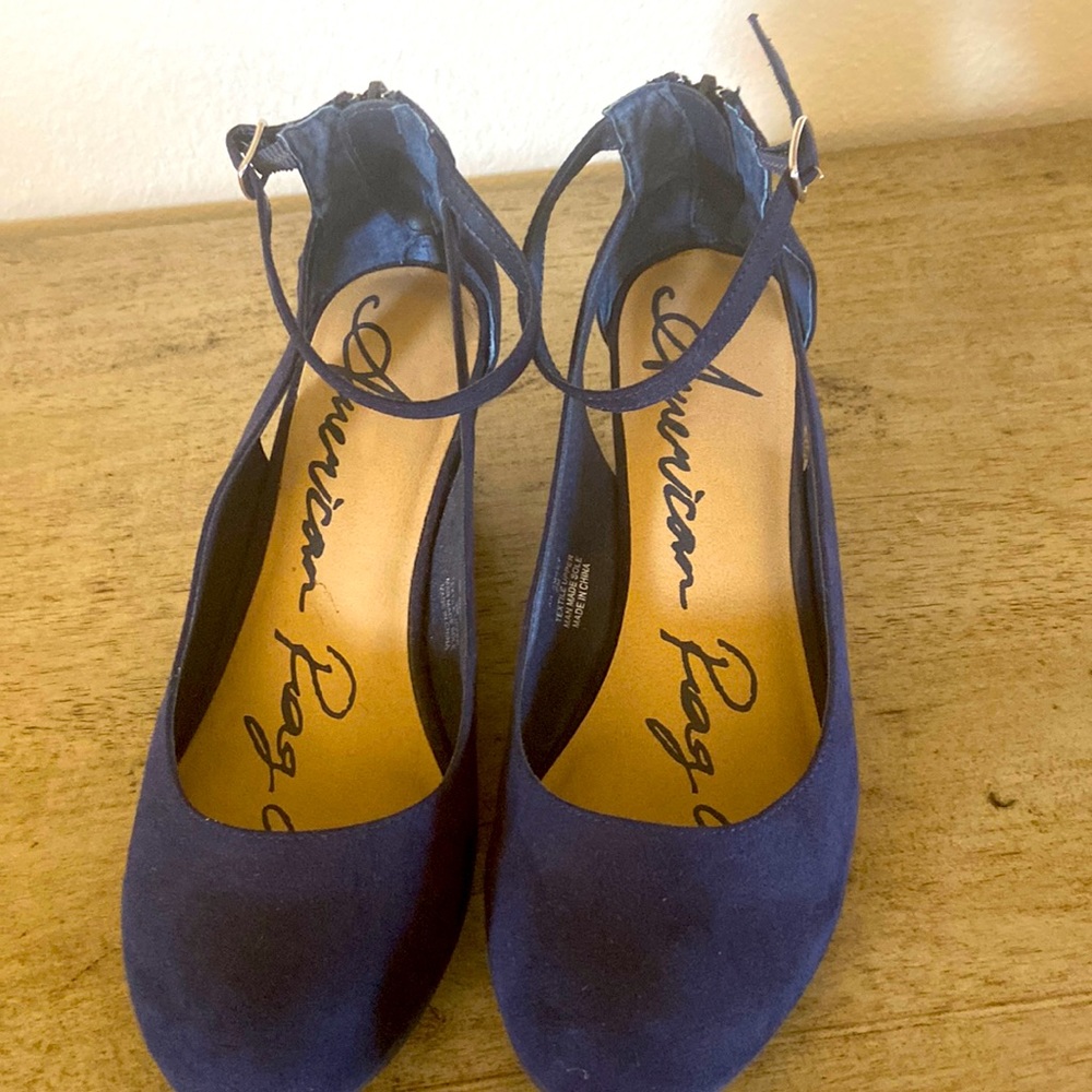 Black suede ankle strap 2 inch wedge. Worn once. Very cute!